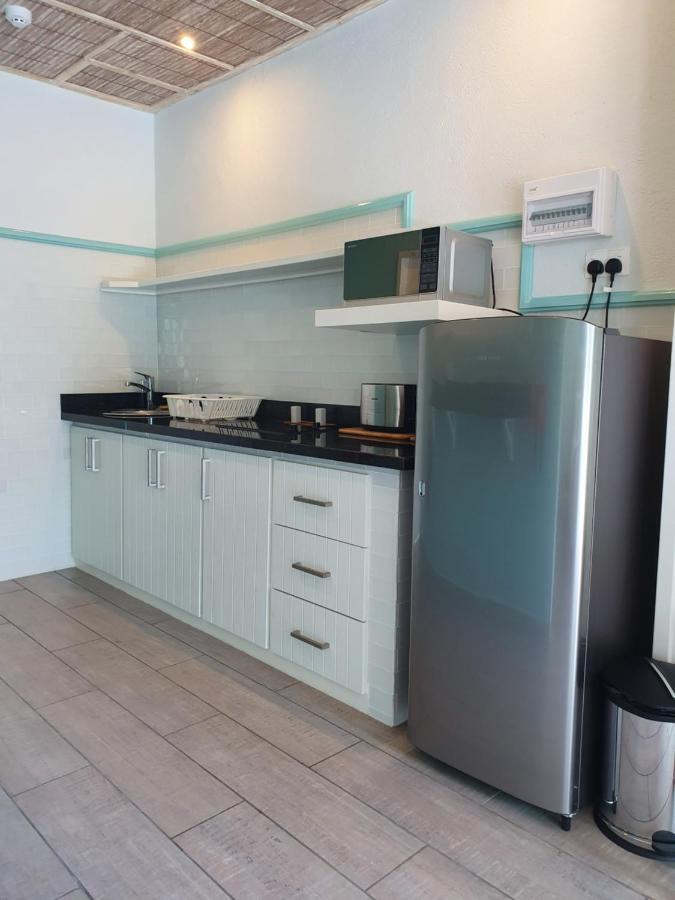 Bord Mer City Apartments La Digue Bagian luar foto